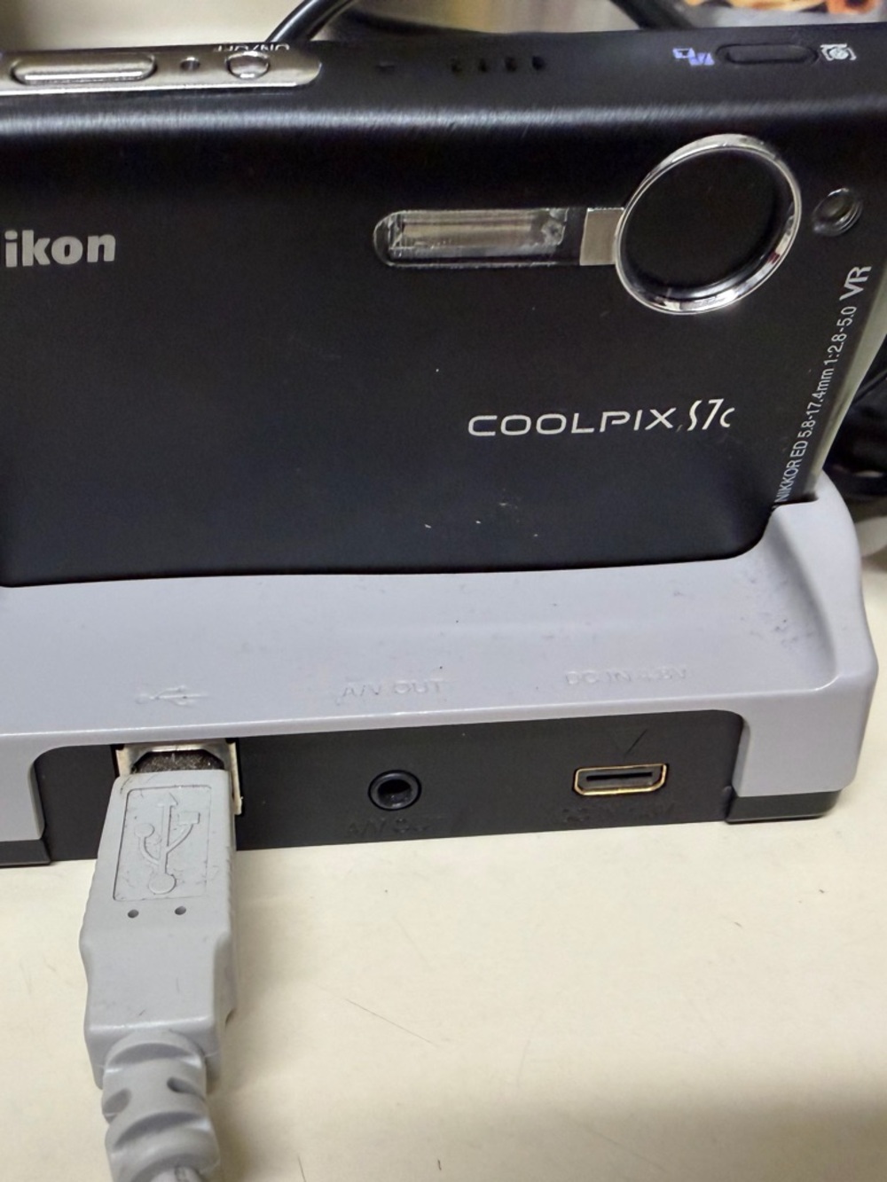 Nikon COOLPIX S7c Compact Digital Camera - Black with Silver Accents includes